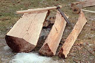 sections of a log split by riving