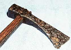 axe with thick wedge shaped blade