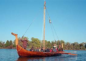 Viking ship being rowed
