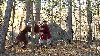 Viking shield bashing an opponent